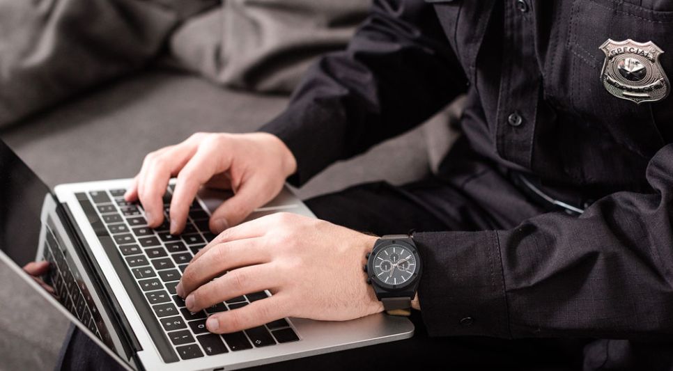 powerready-officer-typing-on-laptop